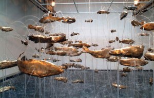 Bruce Nauman, One Hundred Fish Fountain, bronze fish suspended with stainless steel wire from a metal grid, 2005.
