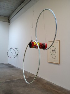 Al Taylor, Cans & Hoops, plastic hula hoops, tin cans, wire, 1993.  