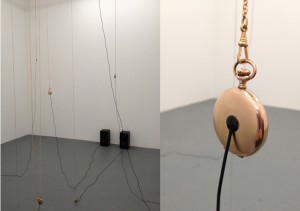 Alicja Kwade, Future in the Past, 8 pocket watches, amplifier, 8 speakers, 10 gold and silver coated chains, 2012.